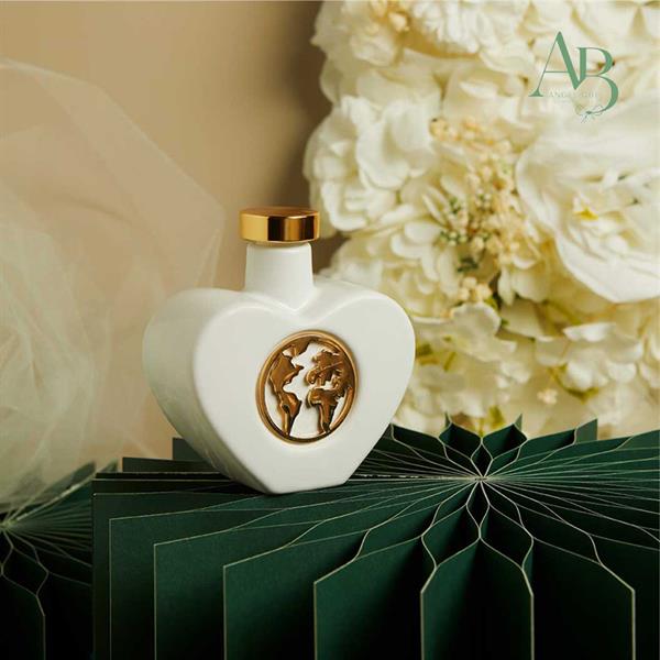 Oliera cuore Claraluna in porcellana con apllicazione mondo oro