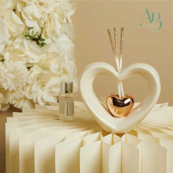 Diffusore cuore Claraluna in porcellana bianca con cuore oro rosa