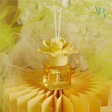 Diffusore Claraluna con fiore in ceramica giallo con 100 ml di essenza