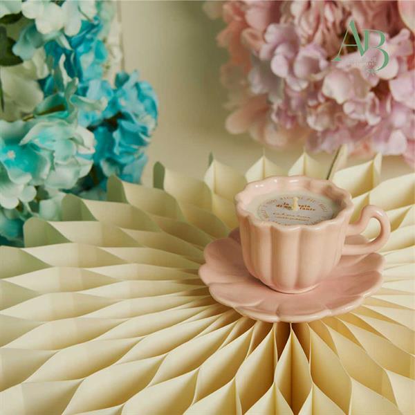 Candela Claraluna in tazza con piattino in porcellana rosa