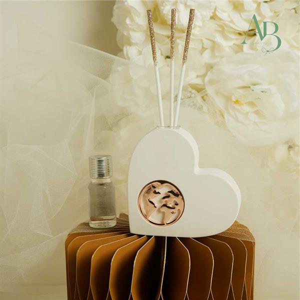 Diffusore cuore Claraluna in gesso con mondo oro rosa