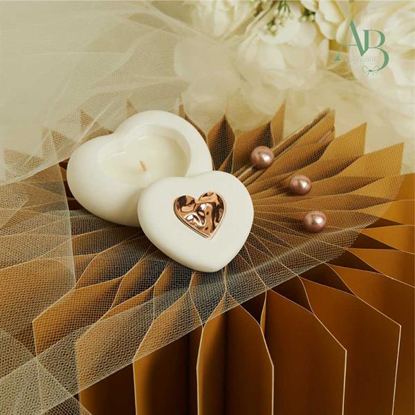 Scatolina cuore Claraluna in gesso con candela e applicazione oro rosa