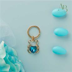 Portachiave Claraluna piccolo colore oro orso con cuore blu