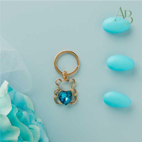 Portachiave Claraluna piccolo colore oro orso con cuore blu