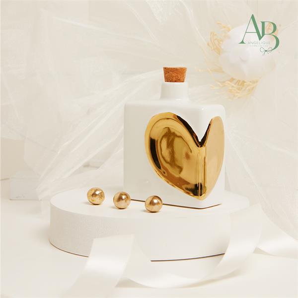Oliera Claraluna in porcellana con cuore gold 9x4x10,6cm, capacità 200 ml