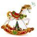 Cavallo a dondolo in resina decorazione natalizia h.54 cm con luci e movimenti musicali