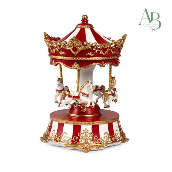 Carillon giostra con decorazioni natalizie in resina h.21,4 cm